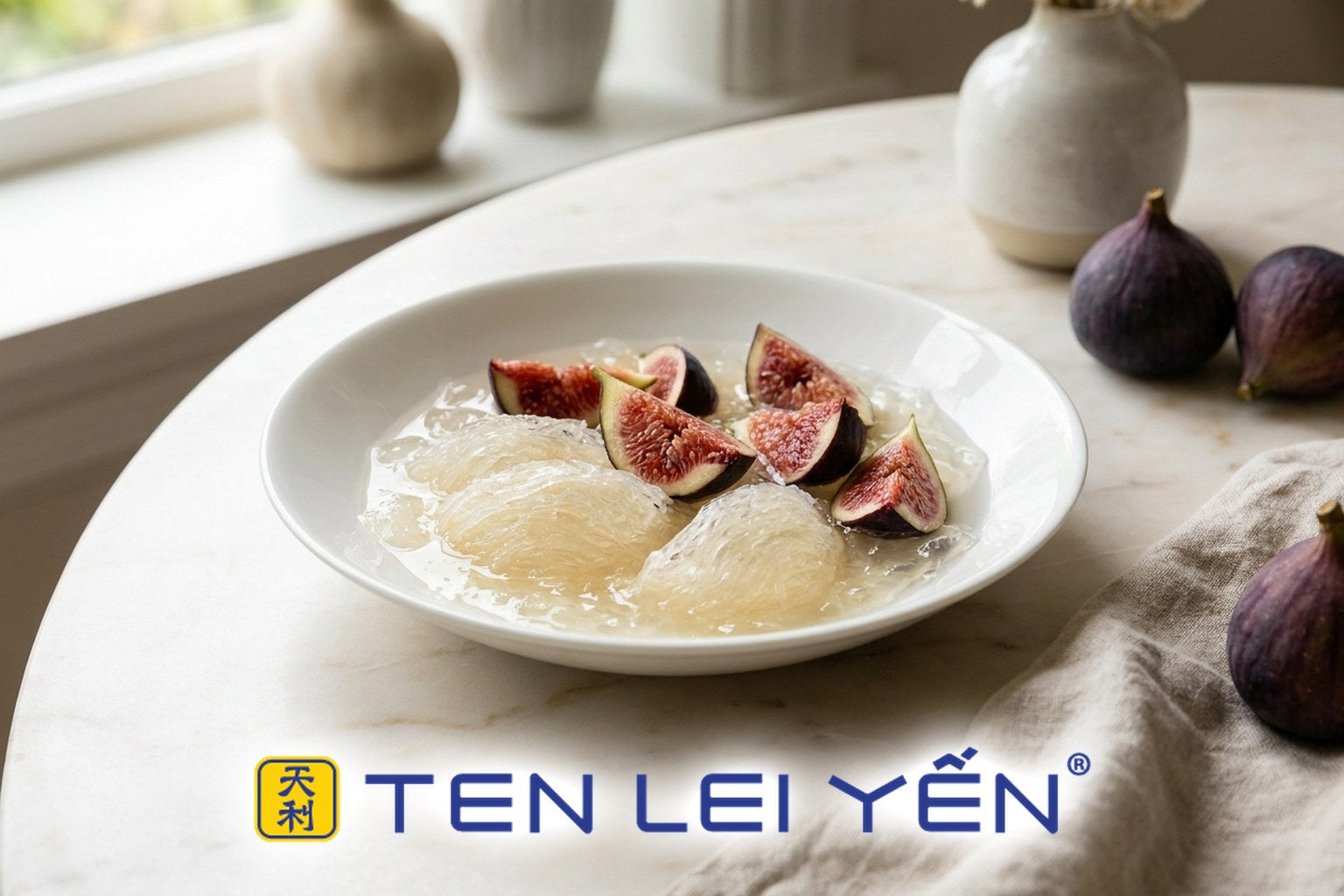 Chilled bird's nest dessert with fresh halved figs in a white porcelain bowl