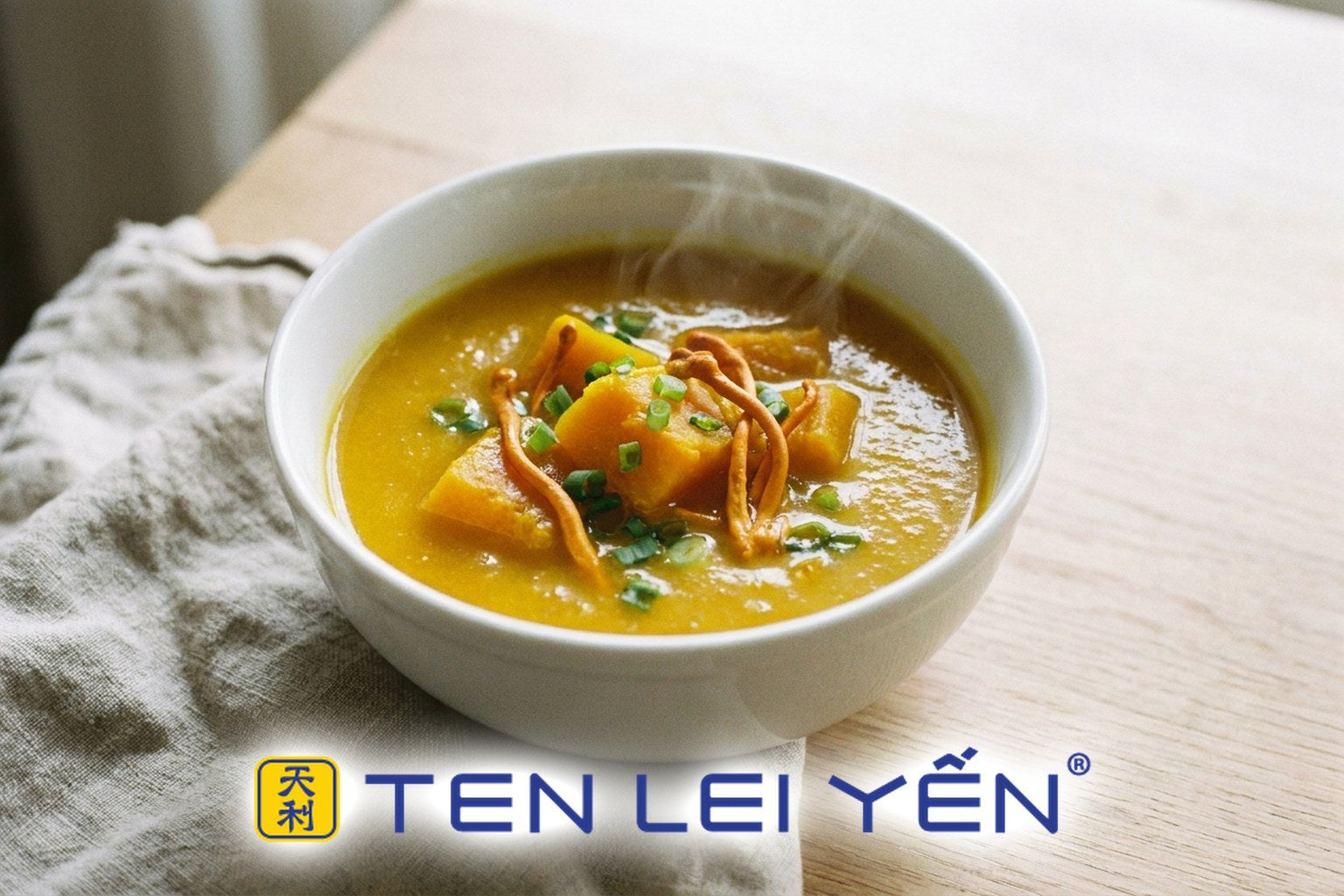 Bowl of kabocha pumpkin soup with orange Cordyceps militaris stalks