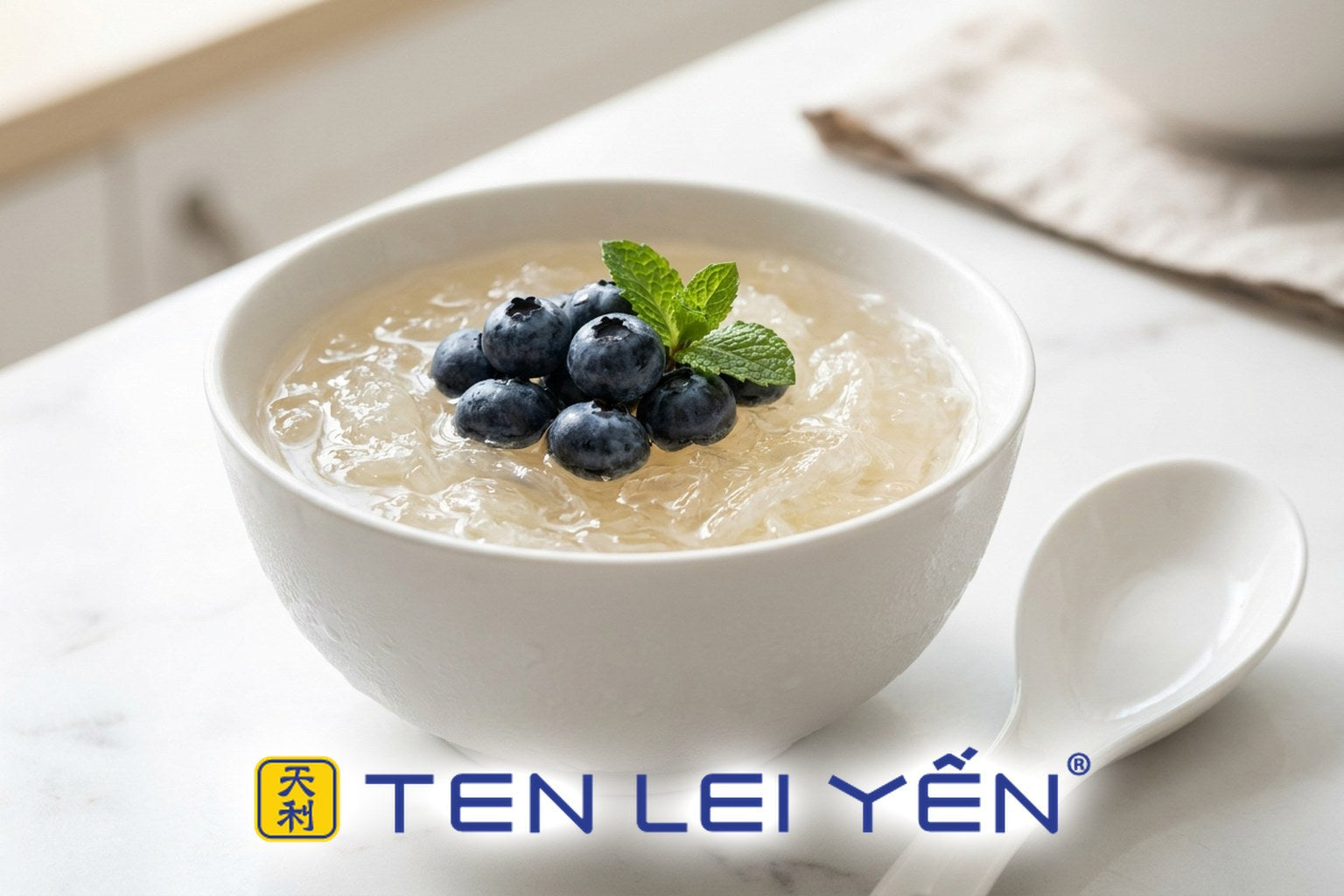 Chilled bird's nest dessert topped with fresh blueberries in a white porcelain bowl