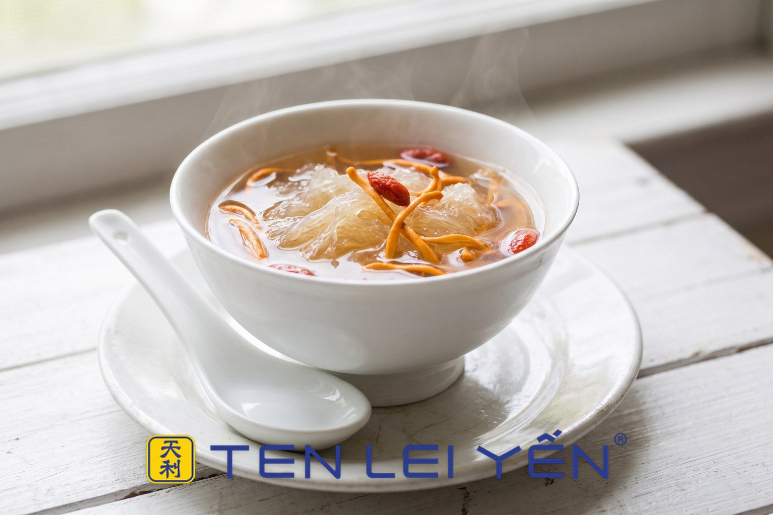 White bowl of double-boiled bird's nest with cordyceps militaris and goji berries