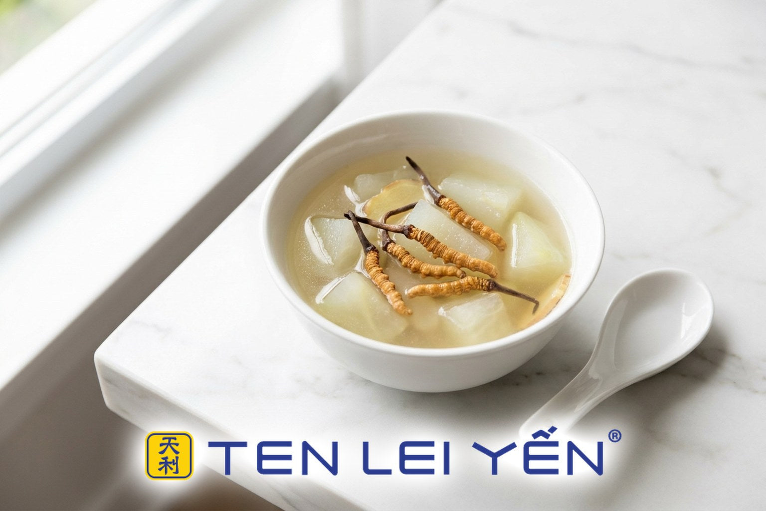 Clear double-boiled wild cordyceps and chayote soup in a white porcelain bowl