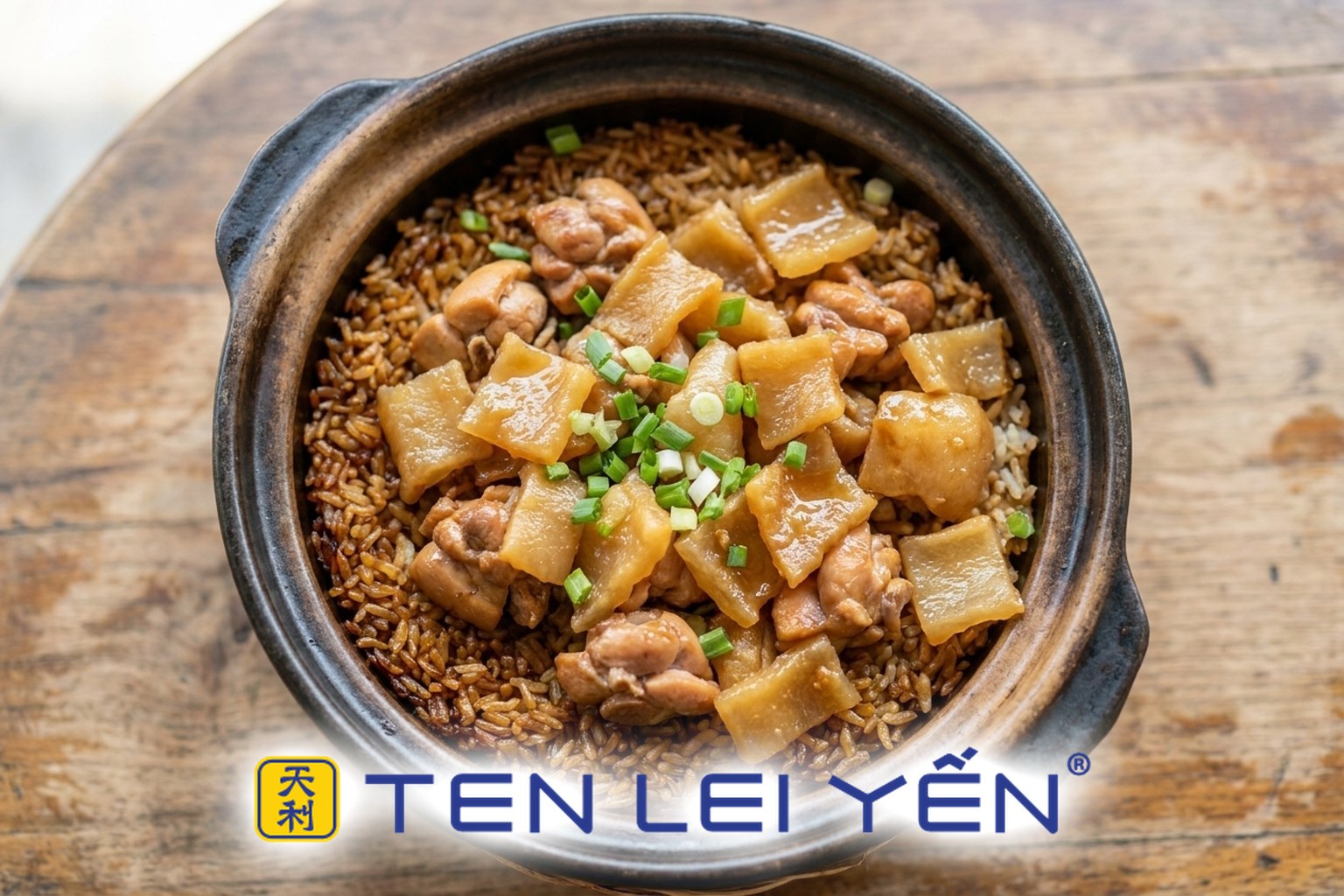 Finished fish maw and chicken claypot rice in a traditional clay pot