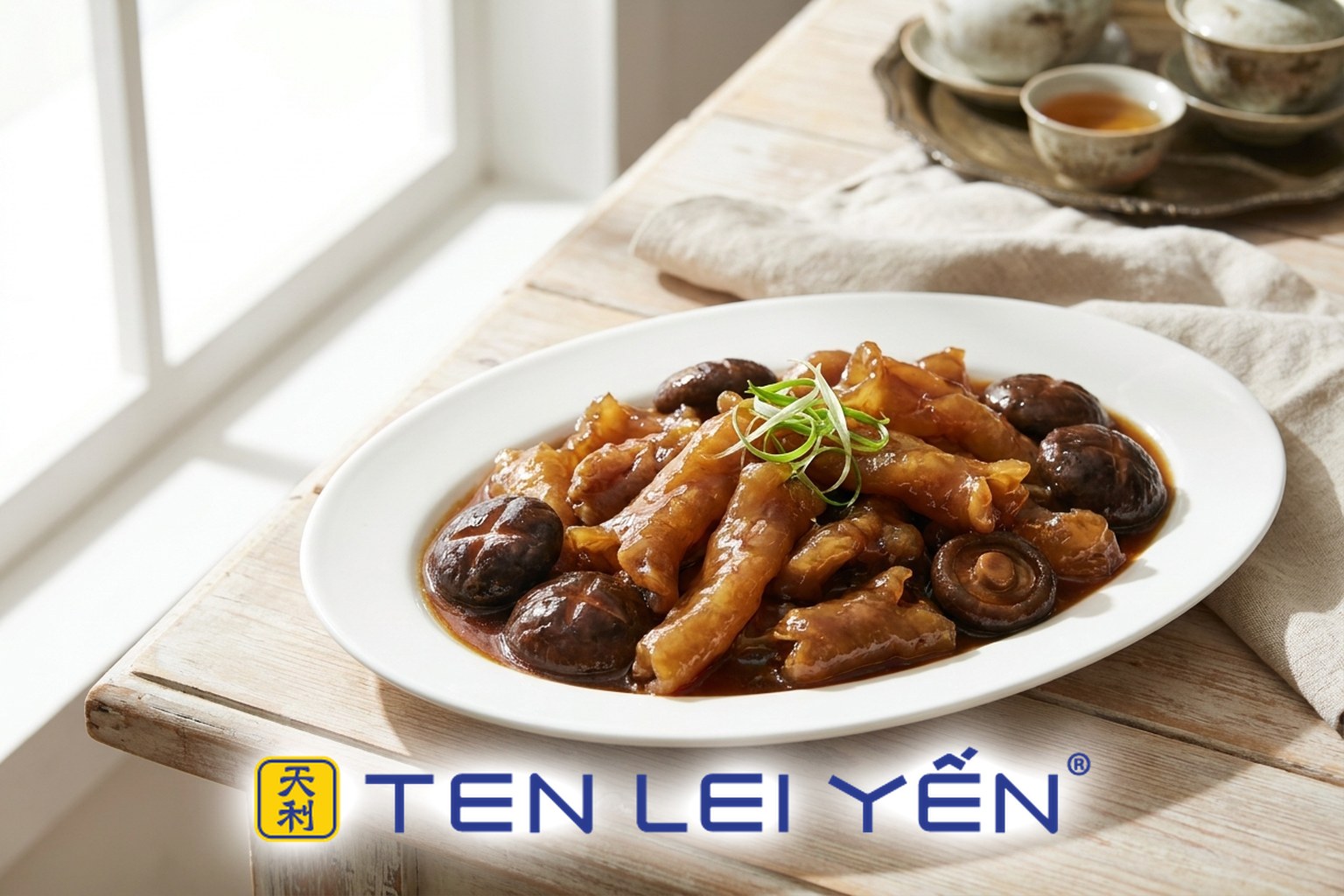 Braised fish maw with shiitake mushrooms in a glossy savory sauce on a white porcelain plate