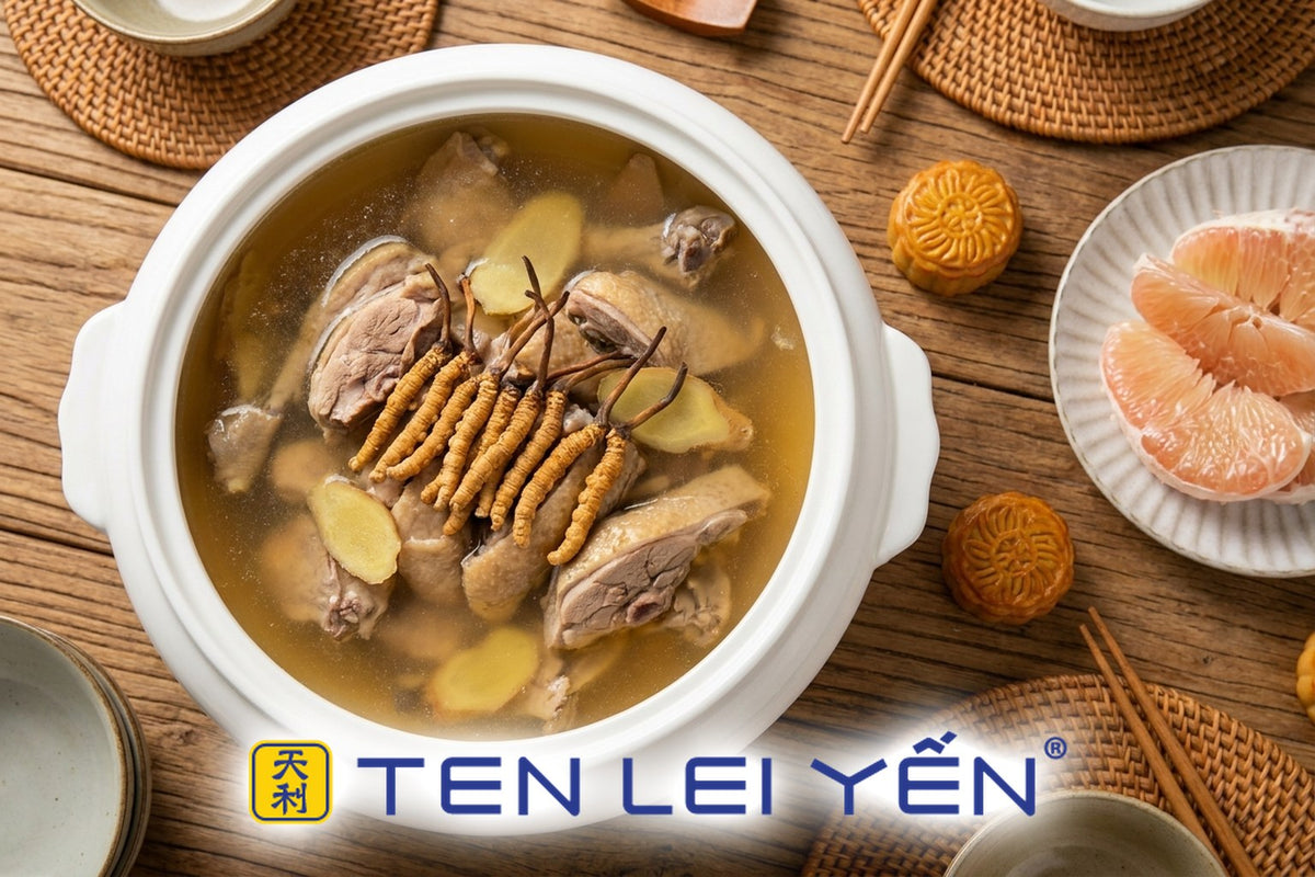 Wild cordyceps and duck soup in a white porcelain tureen for a Mid-Autumn reunion table