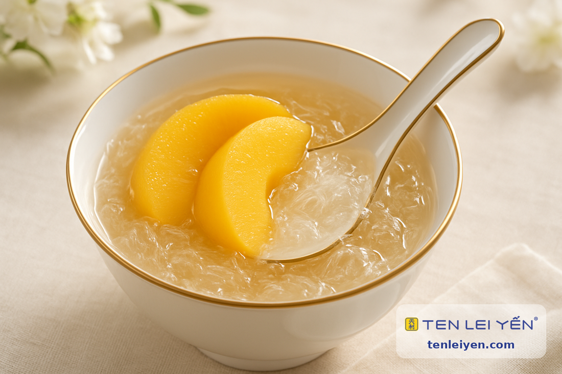 Chilled edible bird's nest dessert with fresh peach in a gold-rimmed porcelain bowl