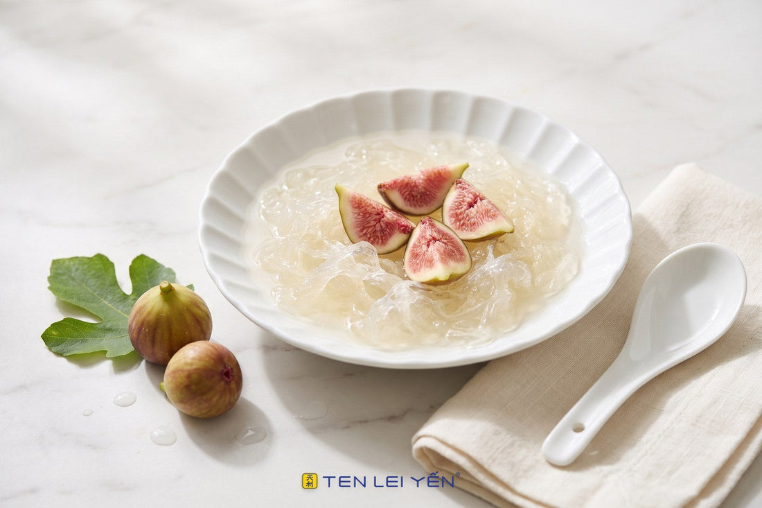 Chilled edible bird's nest with fresh figs, sweetened with monk fruit, in a white porcelain bowl