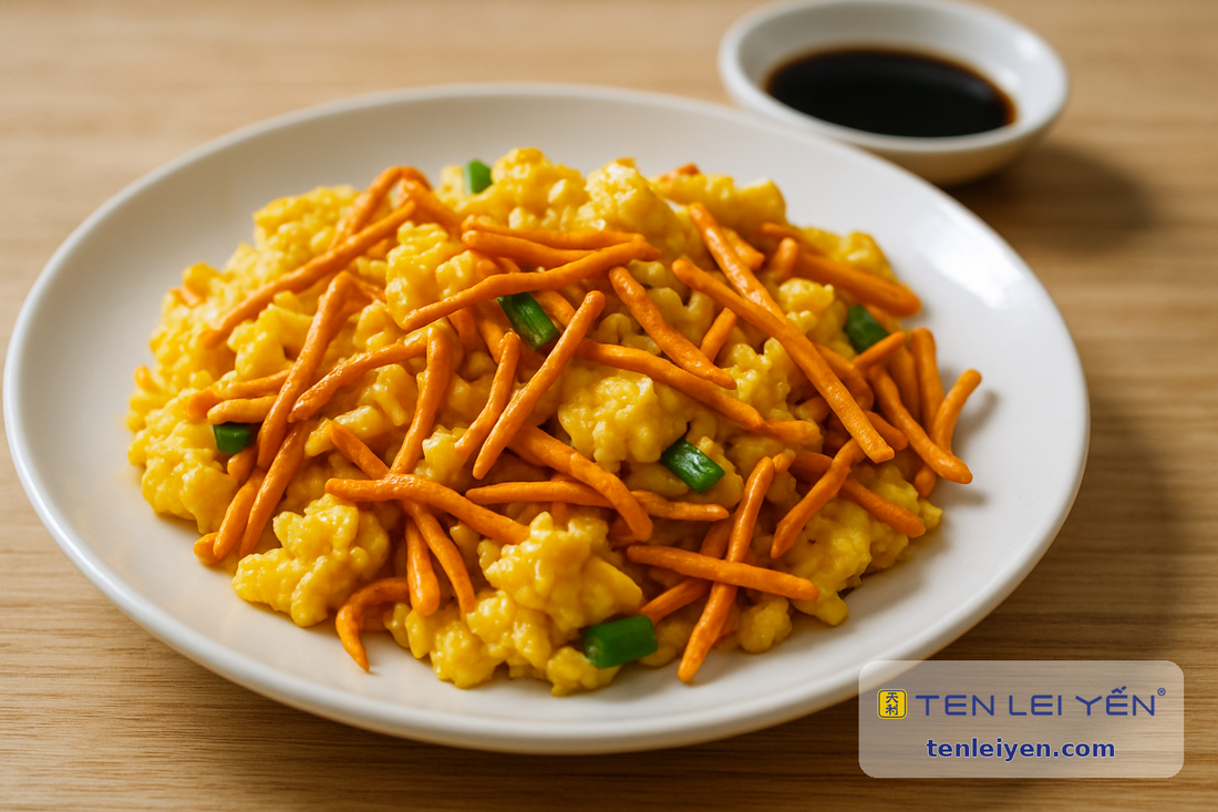 Scrambled eggs with short orange cordyceps militaris pieces and scallion on a white plate