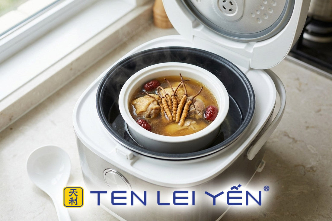 A ceramic double-boiler insert with wild cordyceps and chicken broth set inside a rice cooker